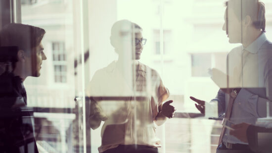 Business people having discussion in modern office